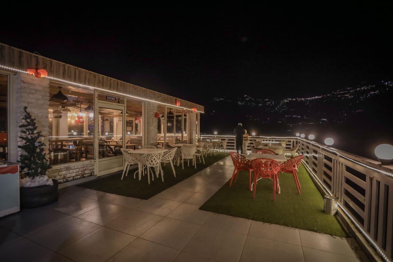 Rooftop terrace lit up at night