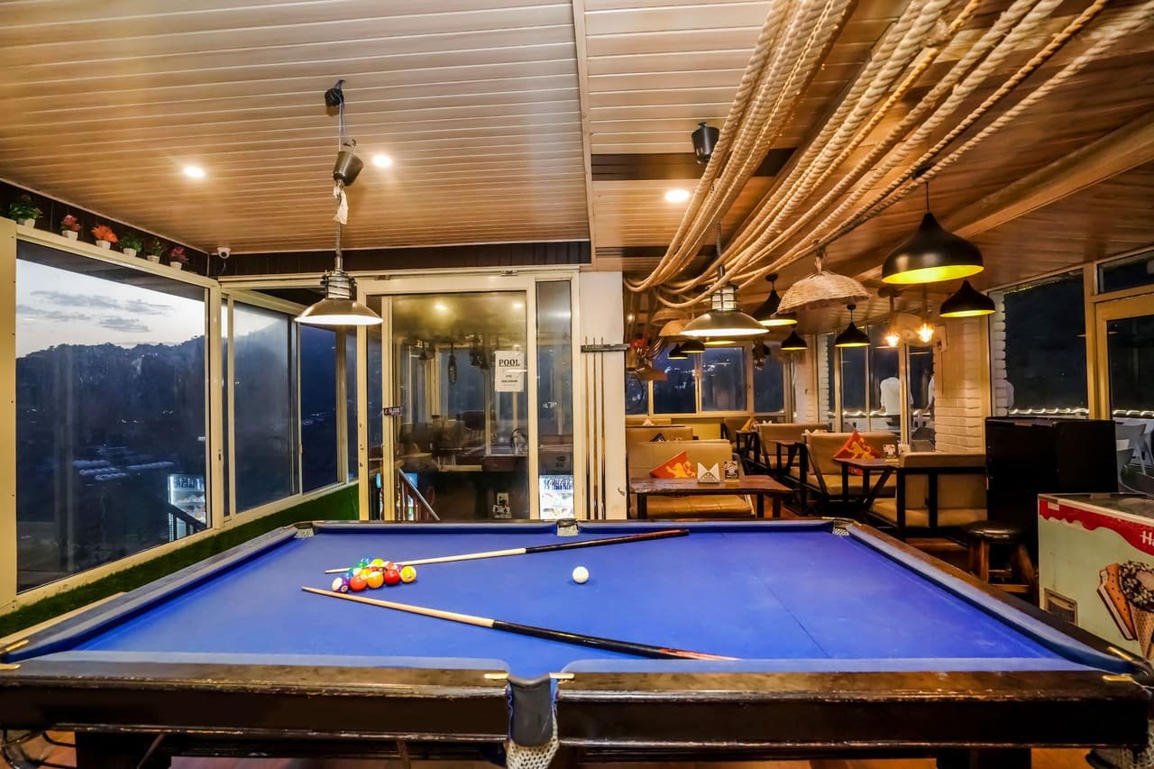 Full-size pool table in the games corner